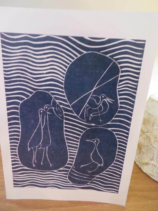 A lino print greetings card titled 'Pebble Birds'.