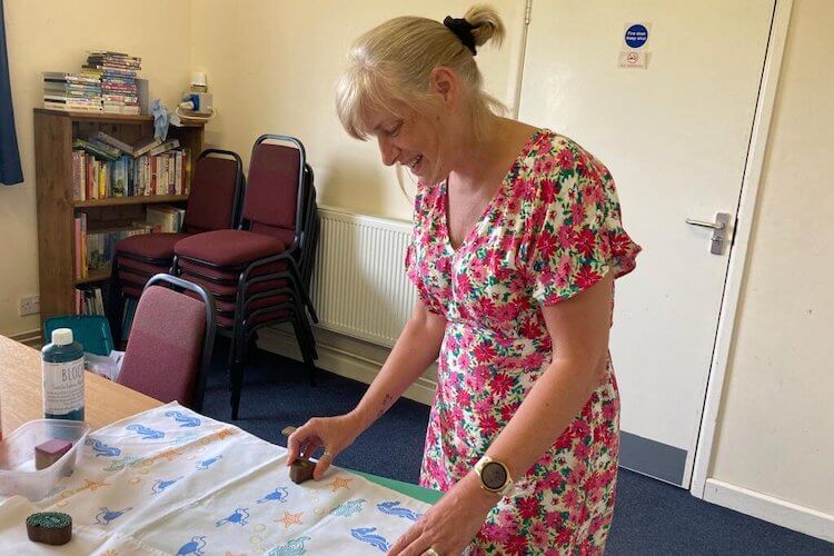 Picture of Jo in her Indian Woodblock Course.